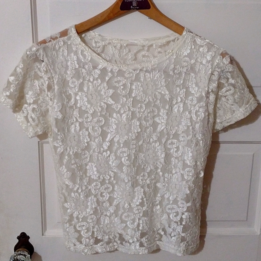 Ivory short sleeve blouse with floral lace design